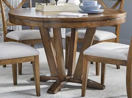 This particular table has three leaves that can make this expand up to 84. Legacy Classic Furniture Highland Saddle Brown 48 66 Wide Round Dining Table With Extension Lc9700521