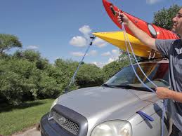 Once you loop the strap under the crossbar, run it back up and towards your kayak until you meet the buckle end. How To Tie Down A Kayak To Any Car Truck Or Suv Discount Ramps