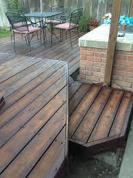 Re Finished Deck To Look Like Hardwood Flooring Pressure Washed It First Then Painted The Edges And Knots With A Dark Brown Sp Deck Paint Patio Staining Deck