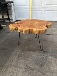 These solid wood slabs are the maze coffee table uses a 3/4″ thick glass top. Live Edge Cedar Blossom Coffee Table Etsy Wood Table Diy Wood Table Design Custom Coffee Table