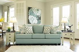 The Daystar Seafoam Sofa From Ashley Furniture Homestore Afhs Com The Daystar Seafoam Upholstery Collection Features Stylishly Shap Green Sofa Home Decor