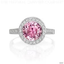 This salmon pink and light orange gem is highly prized for its unique color. Natural Pink Sapphire And Pave Diamond Engagement Ring Pink Sapphire Ring Diamond Sapphire Engagement Ring Pink Sapphire Ring Engagement