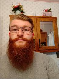 Tall gay man gets haircut and beard trim