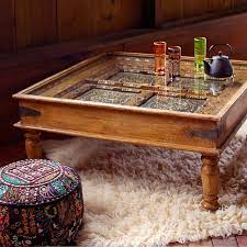 Teak wood construction with spindle work and carved detail an indian coffee table made of an antique window grate inset into a wooden structure accented with. World Market Coffee Table Wood Indian Coffee Table Coffee Table
