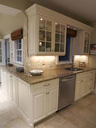 We have stainless steel appliances with stainless steel knobs. Kitchens Susie Chusid Designs
