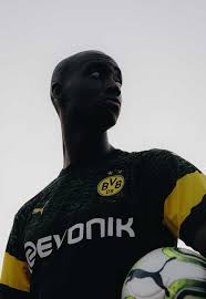 The collar is accentuated at the back of the neck by a yellow stripe. Puma Launch The Borussia Dortmund 18 19 Away Kit Soccerbible