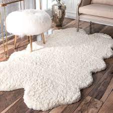 You can even layer rugs for a statement piece. Nuloom Handmade Faux Sheepskin Quarto Pelt White Shag Rug 3 X 6 6 On Sale Overstock 9209986
