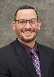 Matthew L. Trinidad, D.C.