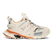 balenciaga track logo detailed leather mesh and rubber sneakers in white modesens