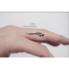 Simple Tiny Flower Finger Tattoo Cute Finger Tattoos Flower Finger Tattoos Tiny Flower Tattoos