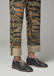 This image is part of an image slider on the homepage of fashion designer dries van noten. Dries Van Noten Petricks Trouser In 2020 Trousers Cropped Pants Dress Shirt Sizes
