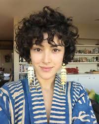 For this look, the hair is quite short and the section on top is longer and very curly. 30 Mesmerizing Curly Pixie Cuts You Need To Try Proving Easy Beauty Ideas On Latest Fashion Trend