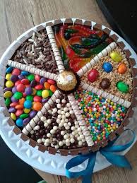 A Kit Kat Cake That Has A Little Something For Everyone In The House Candy Birthday Cakes Sweetie Cake Candy Cakes