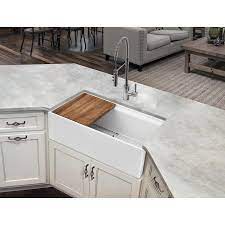 The farm sink was designed with a cut out of from the cabinetry in your kitchen so that the sinks front apron's off the side offering extra space for dish cleaning and meal prep. Superior Sinks Farmhouse Apron Front 33 In X 19 In White Single Bowl Workstation Kitchen Sink In The Kitchen Sinks Department At Lowes Com