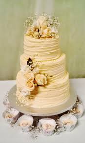 3 Tier Wedding Cake With Butter Cream Covering Dressed With Fresh Flowers Cream Wedding Cakes Simple Wedding Cake Buttercream Wedding Cake