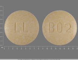 Light blue, round, scored on one side, blank on the other. L Yellow And Round Pill Images Pill Identifier Drugs Com