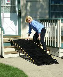 Quite frequently it is necessary to transport a set of portable ramps to allow my wheelchair to get into homes and shops. Portable Ramp Installation Handiramp
