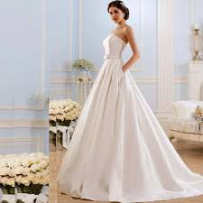 Find since 2004, we've been connecting buyers and sellers of new, sample and used wedding dresses and bridal party gowns. Discountvintage Strapless A Line Wedding Dresses 2020 With Pockets Bow Sweep Train Satin Lace Up Back Wedding Bridal Gowns From Prettysell99 135 68 Dhgate Com