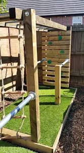 Outside Jungle Gym Made From Fence Posts And Metal Bars From An Old Swing Backyard Play Backyard For Kids Backyard Playground