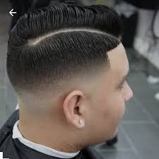 The comb over often gets a bad rap as a 1970s hairstyle for hiding a bald spot on top. Skin Fade Comb Over Hairstyle American Girl
