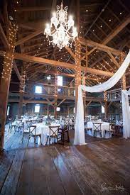 Rustic Barn Wedding Venue In Indiana With Gorgeous Lighting And Elegant Drapery Barn Wedding Venue Rustic Barn Wedding Barn Wedding