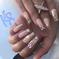 Bling bling nail art designs displays diamonds, nail studs, and zebra print designs. 23 Glitzy Nails With Diamonds We Can T Stop Looking At Stayglam