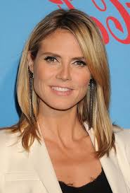 Heidi klum shows that sleek and straight with bangs is a super trendy look. Heidi Klum Latest Hairstyle With Long Layers For Winter Hairstyles Weekly