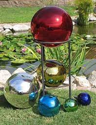 Be sure that you accommodate for the mature size of your plants. Glass Gazing Balls From Mexico Bowling Ball Garden Bowling Ball Yard Art Bowling Ball Art