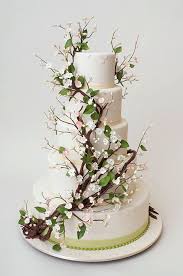 This Rustic Wedding Cake From Ron Ben Israel Cakes Features Twisting Branches And Tiny Blooms A Fabulo With Images Wedding Cake Rustic Wedding Cakes Gorgeous Wedding Cake