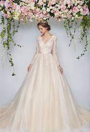 Cream V Neck Wedding Ball Gown With Lace Sleeves The Wedding Scoop S Favorite Rico A Wedding Dresses 2017 Trend Ball Gowns Wedding Wedding Dress Long Sleeve