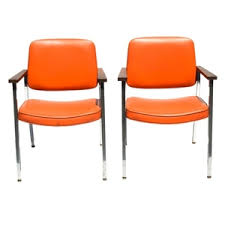 Check out our mid century chairs selection for the very best in unique or custom, handmade pieces from our furniture shops. Lot Art Mid Century Modern Orange Vinyl Office Chairs By United Chair Company
