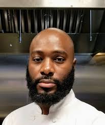 The man who owns the first Haitian Restaurant in Kansas City