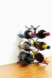 With the wine rack's free standing display, you can place it on a counter top, a table, or anywhere that best suits your home. Superiore Livello Turin Wine Rack 6 Bottle Countertop Metal Wine Holder Free Standing Rack For Floor Or Table Top Modern Sc Wine Rack Countertop Wine Rack Wine