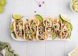 These tasty fish fillets are seasoned with a citrus marinade, grilled, and served in soft, warm corn tortillas with a cilantro coleslaw, pico de gallo, avocado slices, and queso fresco cheese. Smoker Grilled Fish Tacos With Garlic Cilantro Lime Coleslaw Xoxobella