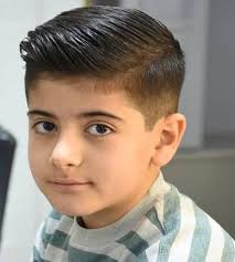 Sides are closely shaved while the long top is cropped to form a thick flat top. Pin On Boy Haircuts