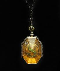 A proud slytherin who seeks artefacts from the house's past will not resist this wand. A Heavy Golden Locket That Can Be Opened By Speaking Parseltongue Slytherin Locket Harry Potter Props Fandom Jewelry