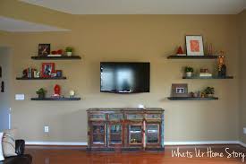 Hexagonal shape of the shelf makes it suitable for room corners. How To Decorate Around A Tv With Floating Shelves Whats Ur Home Story