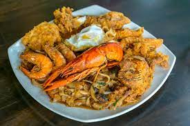 So i switch the flame off and add them. Best Halal Special Char Koay Teow In Penang Crisp Of Life