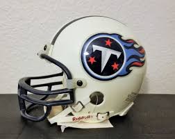 The tennessee titans are changing up their uniforms for 2018 so we decided to create a concept titans helmet to see if it would work with their new design. 1995 Riddell Mini Football Helmet With Chin Strap Tennessee Titans With Box Tennesseetitans Football Helmets Helmet Mini Football Helmet