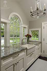 the butler s pantry offers copious countertop space and great storage the palladian window is kitchen bathroom remodel kitchen remodel kitchen and bath design