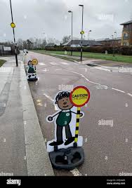 Dont park here outside a school Northampton UK lolly pop lady caution  children crossing no parking danger speed speeding stop beware schools  crossing Stock Photo - Alamy