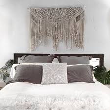 Above a mantel or fireplace is the perfect place to layer pieces. Lightworkers Home Bedroom Wall Hangings Hanging Wall Decor Bedroom Wall Decor Above Bed