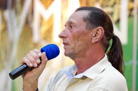 Senior Rower is Loading Liteboat Rowing Shell