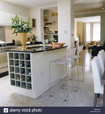 a modern kitchen with dining area