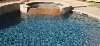 Created with pebbles from around the world, selected for their color and beauty. Pebble Tec With Moonlight Grey Finish