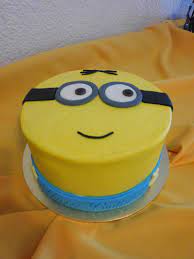 Stack the cakes and push through the 3 skewers to hold the cake together. Minion Cake Minion Cake Cake Butter Icing