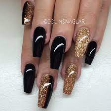 Matte taupe with gold glitter + matte black with gold glitter. Black And Gold Coffin Nails Nails Matte Nails Black Nails Nails