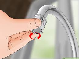 The basin wrench is designed to work in tight spaces. How To Install A Kitchen Faucet 15 Steps With Pictures