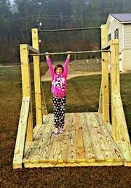 Homemade Gymnastics Uneven Bars By Heads Plumbing Marine Contracting If You Would Like A Set We Do Custo Gymnastics Diy Diy Gymnastics Bar Gymnastics Room