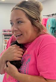 Customer brings baby raccoon to pet friendly store